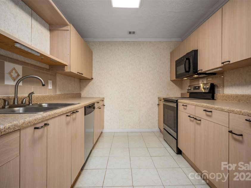 163 Woodland Drive, Columbus, NC 28722.  MLS# CAR4240701, YatesRealty ID 11111. Plenty of cabinets and counter space