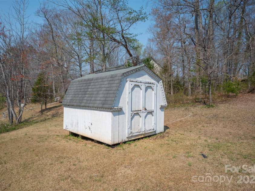 163 Woodland Drive, Columbus, NC 28722.  MLS# CAR4240701, YatesRealty ID 11111. Ten by twelve storage shed