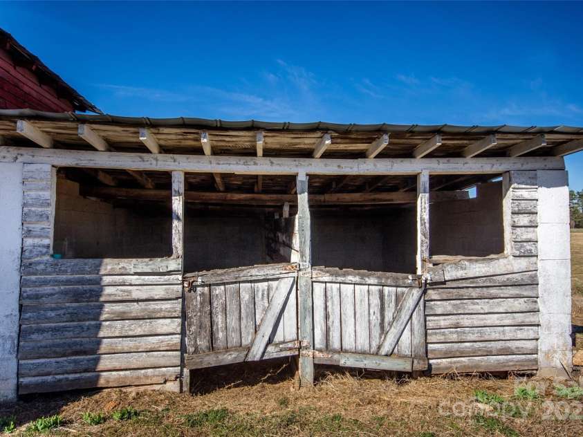 169 Eagle Mills Road, Harmony, NC 28634.  MLS# CAR4229073, YatesRealty ID 11113. Additional stables