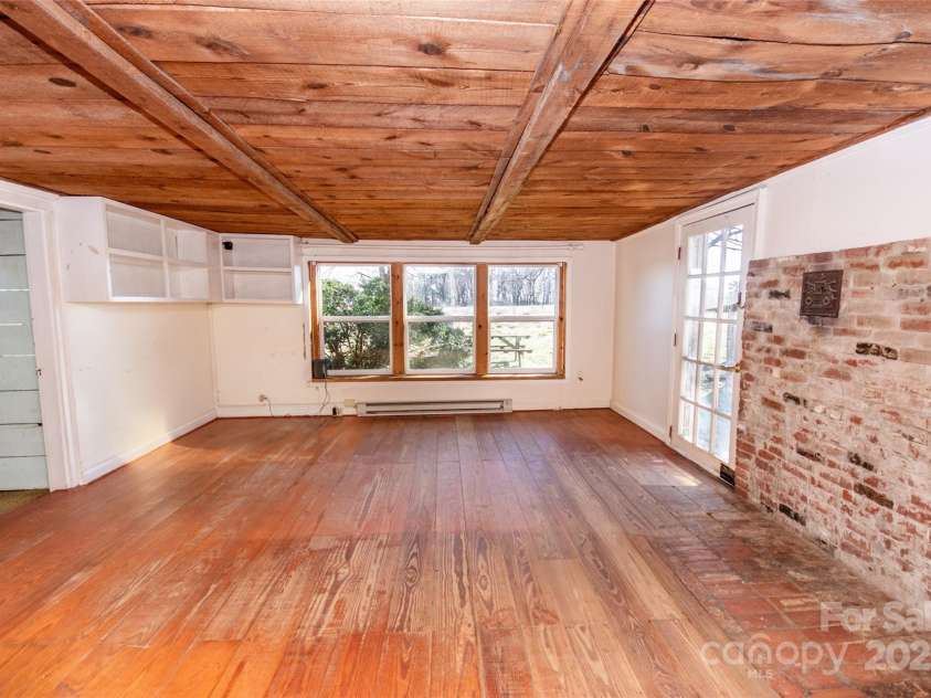 169 Eagle Mills Road, Harmony, NC 28634.  MLS# CAR4229073, YatesRealty ID 11113. Family room