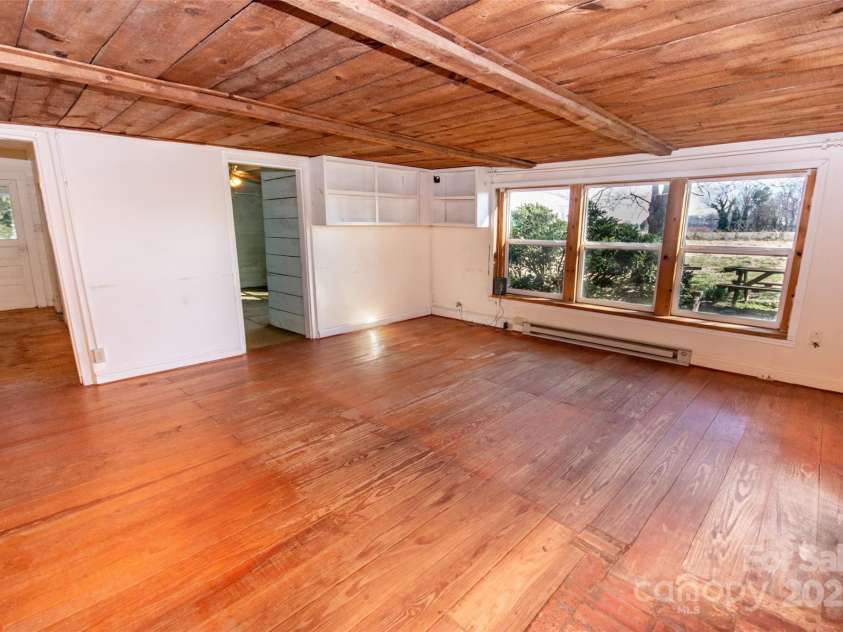 169 Eagle Mills Road, Harmony, NC 28634.  MLS# CAR4229073, YatesRealty ID 11113. Family room