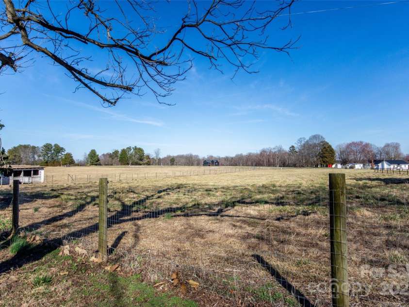 169 Eagle Mills Road, Harmony, NC 28634.  MLS# CAR4229073, YatesRealty ID 11113. View from front porch