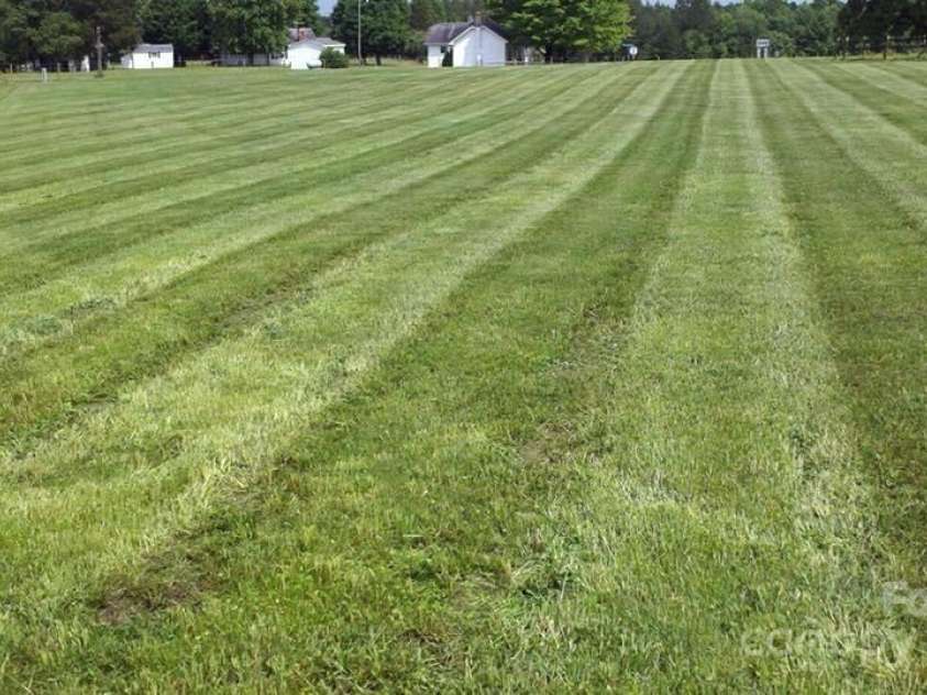 169 Eagle Mills Road, Harmony, NC 28634.  MLS# CAR4229073, YatesRealty ID 11113. What the grass looks like later in the Spring