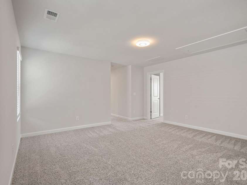 11935 Red Leaf Drive, Charlotte, NC 28215.  MLS# CAR4361968, YatesRealty ID 11115. Main level Bedroom/Office
