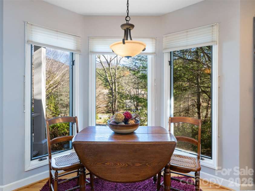 2 Bent Tree Drive, Asheville, NC 28803.  MLS# CAR4335530, YatesRealty ID 11119. Breakfast area with bay window