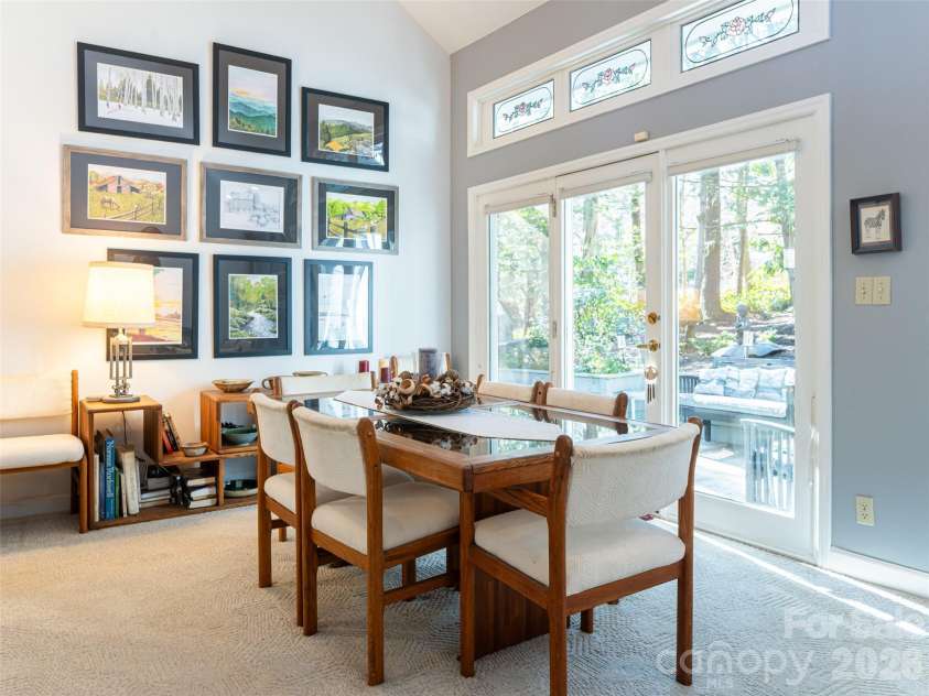 2 Bent Tree Drive, Asheville, NC 28803.  MLS# CAR4335530, YatesRealty ID 11119. Dining area opens on to back patio