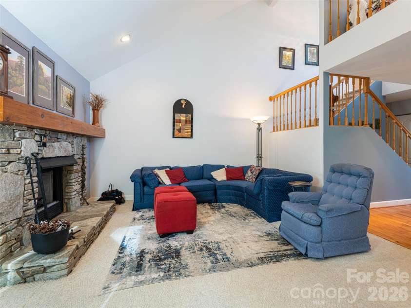 2 Bent Tree Drive, Asheville, NC 28803.  MLS# CAR4335530, YatesRealty ID 11119. Great room with vaulted ceiling