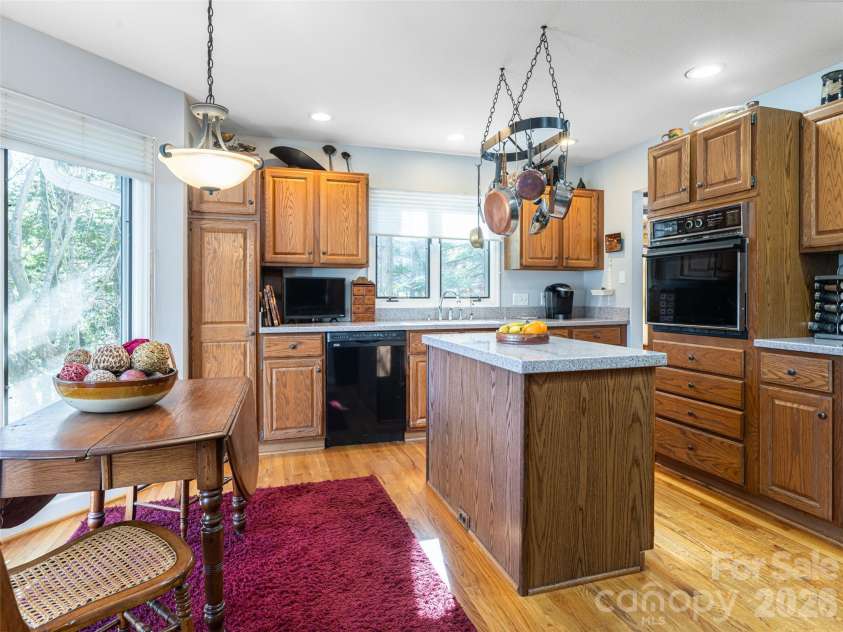 2 Bent Tree Drive, Asheville, NC 28803.  MLS# CAR4335530, YatesRealty ID 11119. Spacious kitchen with breakfast area