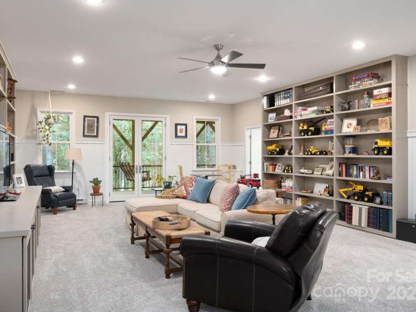 6 LaRue Court, Biltmore Lake, NC 28715.  MLS# CAR4176289, YatesRealty ID 11123. Lower Level Family Room