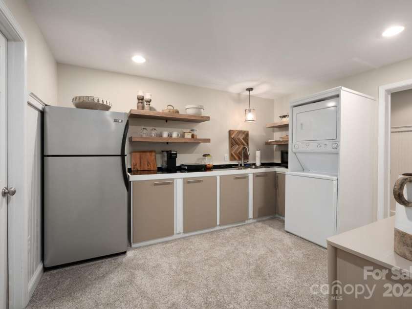 6 LaRue Court, Biltmore Lake, NC 28715.  MLS# CAR4176289, YatesRealty ID 11123. Lower Level Kitchen