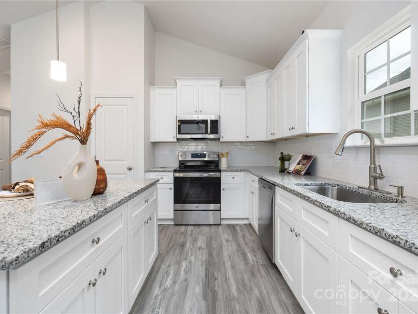 5824 Patton Street, Charlotte, NC 28269.  MLS# CAR4237409, YatesRealty ID 11124. Representation