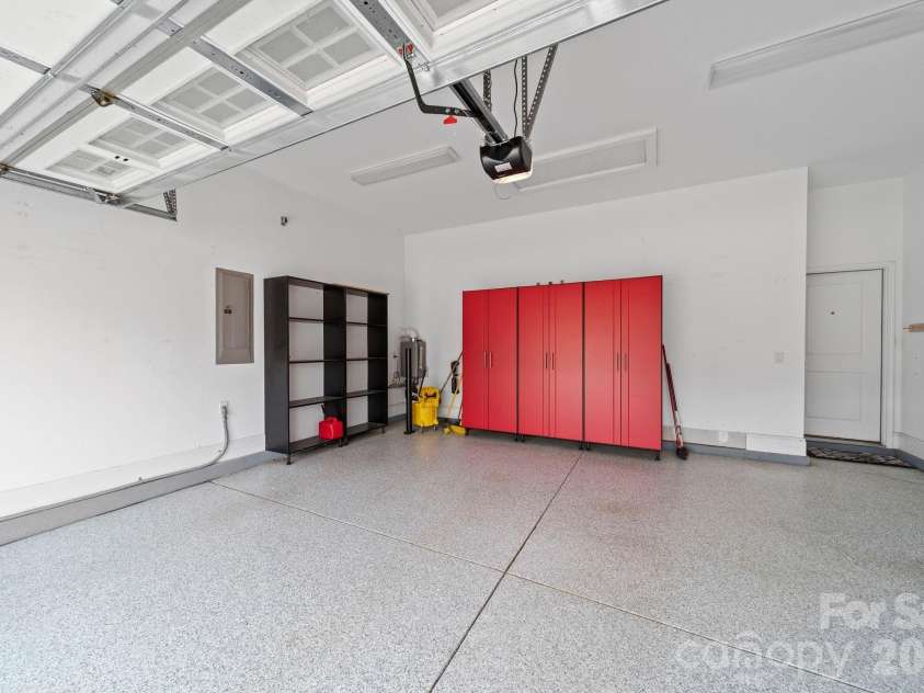 14817 High Bluff Court, Charlotte, NC 28278.  MLS# CAR4332465, YatesRealty ID 11127. Garage with Epoxy Floors and Storage Cabinets