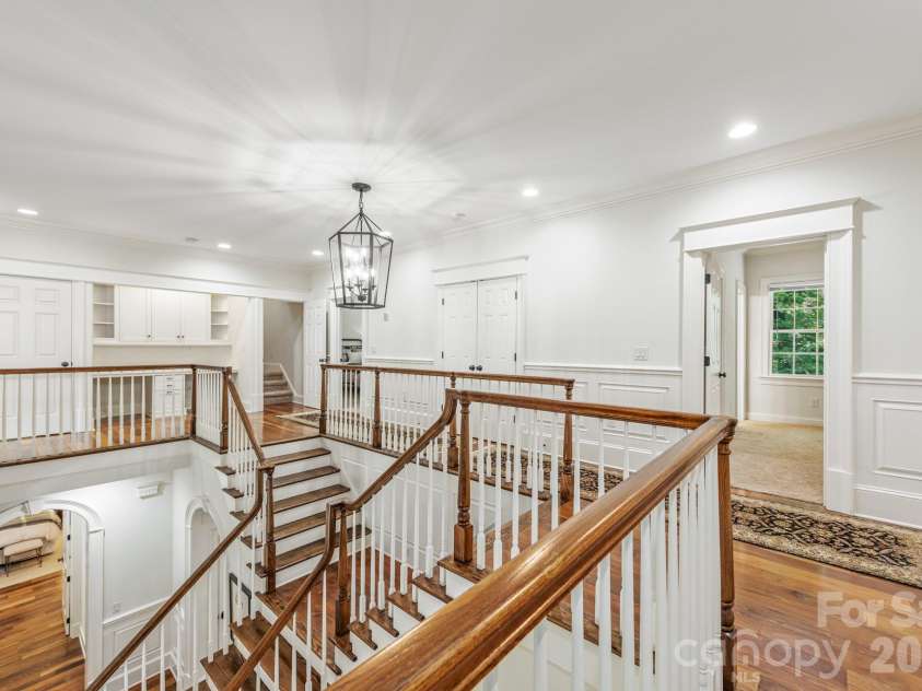 946 Laurel Creek Lane, Charlotte, NC 28211.  MLS# CAR4298519, YatesRealty ID 1113. 2nd Floor Grand Staircase walkway and study space