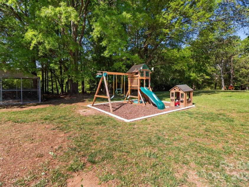 1238 Moss Springs Road, Albemarle, NC 28001.  MLS# CAR4248071, YatesRealty ID 11135. Backyard