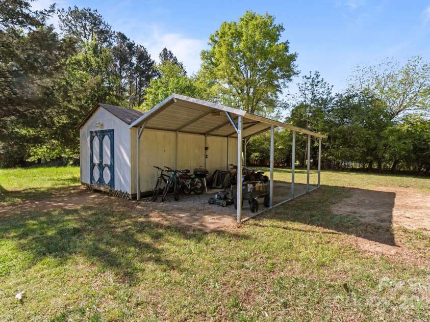 1238 Moss Springs Road, Albemarle, NC 28001.  MLS# CAR4248071, YatesRealty ID 11135. Shed and Carport