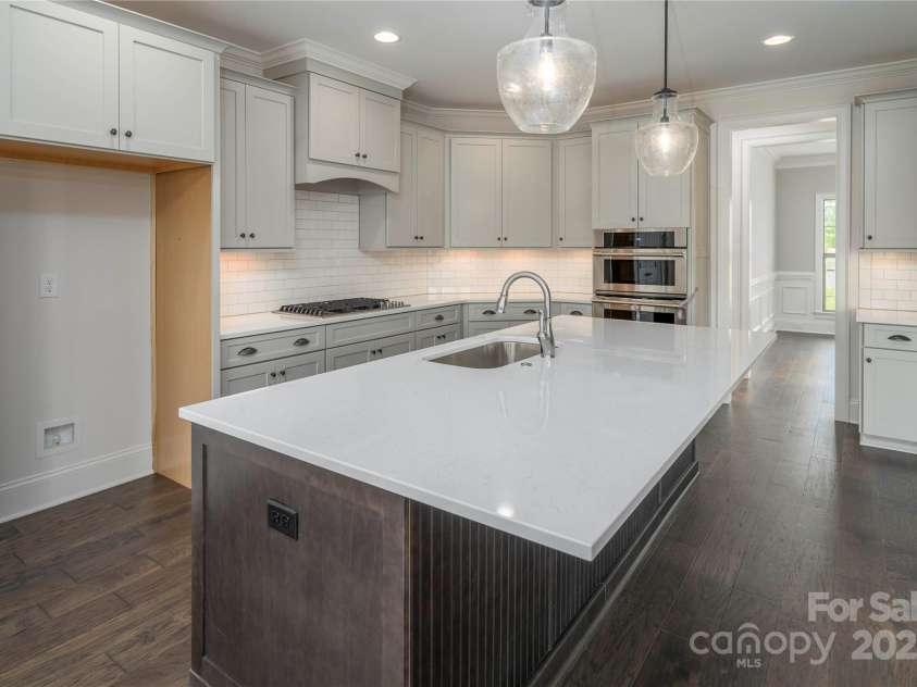 104. Wilharr Court, Mooresville, NC 28115.  MLS# CAR4255115, YatesRealty ID 11136. Please Note Photos are of completed home with similar finishes.   Plan to be reversed on this homesite