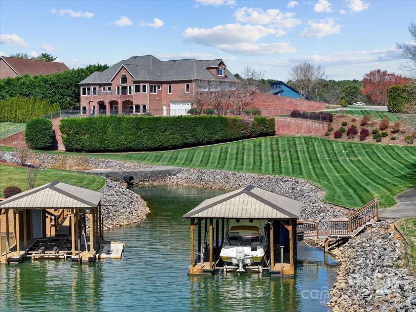 5809 Selkirk Drive, Hickory, NC 28601.  MLS# CAR4235652, YatesRealty ID 11140. Covered Dock with boat lift