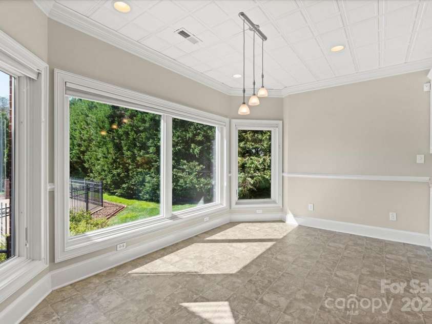 5809 Selkirk Drive, Hickory, NC 28601.  MLS# CAR4235652, YatesRealty ID 11140. Lower level dining area