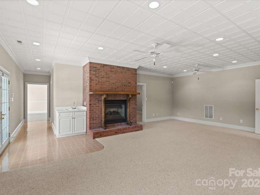 5809 Selkirk Drive, Hickory, NC 28601.  MLS# CAR4235652, YatesRealty ID 11140. Lower level Family Room