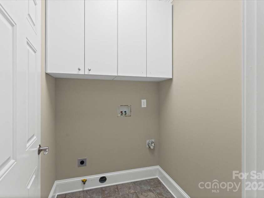 5809 Selkirk Drive, Hickory, NC 28601.  MLS# CAR4235652, YatesRealty ID 11140. Lower level laundry area
