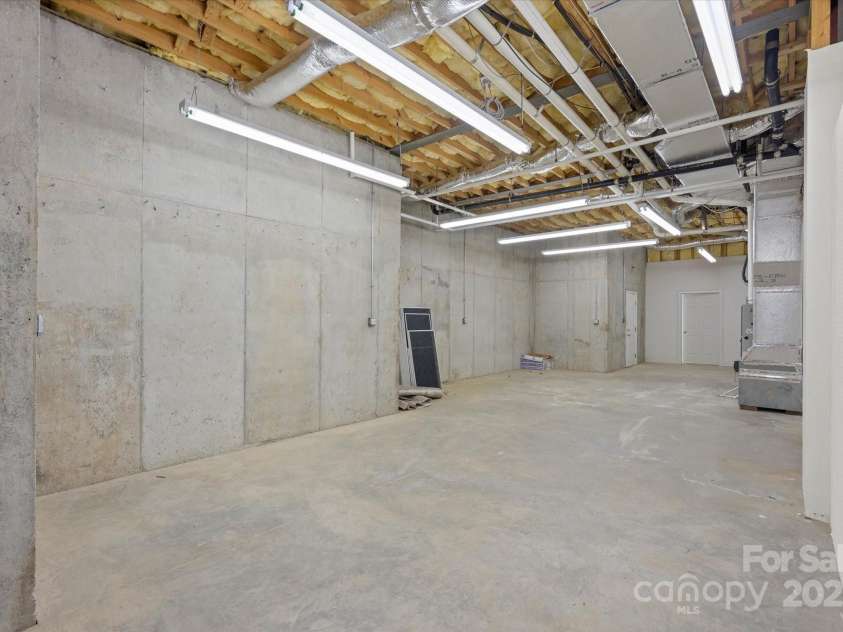 5809 Selkirk Drive, Hickory, NC 28601.  MLS# CAR4235652, YatesRealty ID 11140. Lower level unfinished storage area