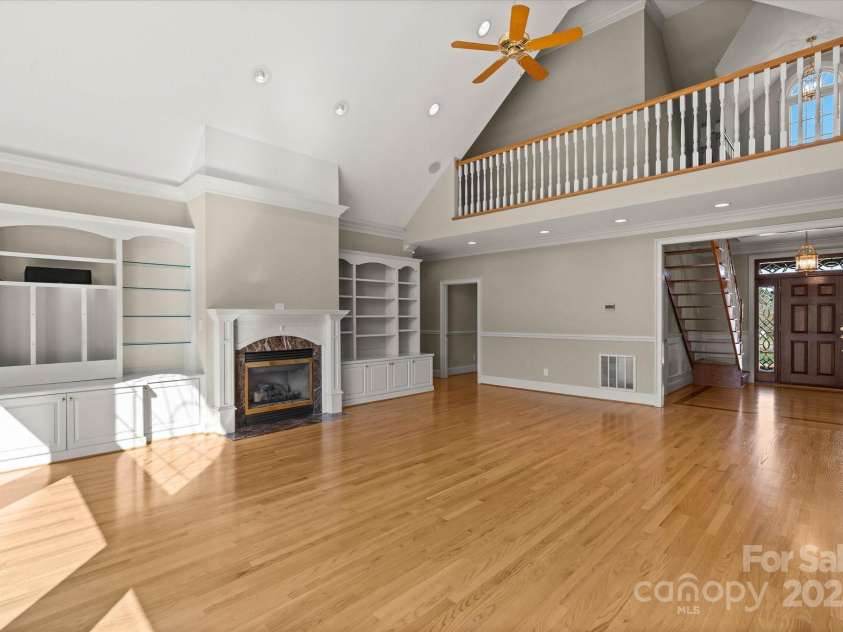 5809 Selkirk Drive, Hickory, NC 28601.  MLS# CAR4235652, YatesRealty ID 11140. Main living room with gas fireplace