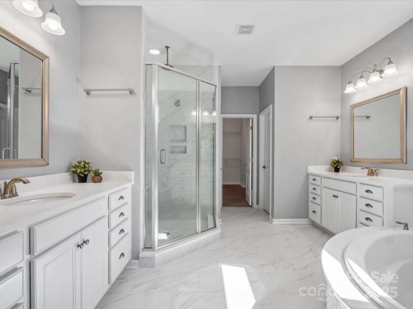 11931 The Ramble Drive, Huntersville, NC 28078.  MLS# CAR4252530, YatesRealty ID 11141. Main Floor Primary Bathrooom