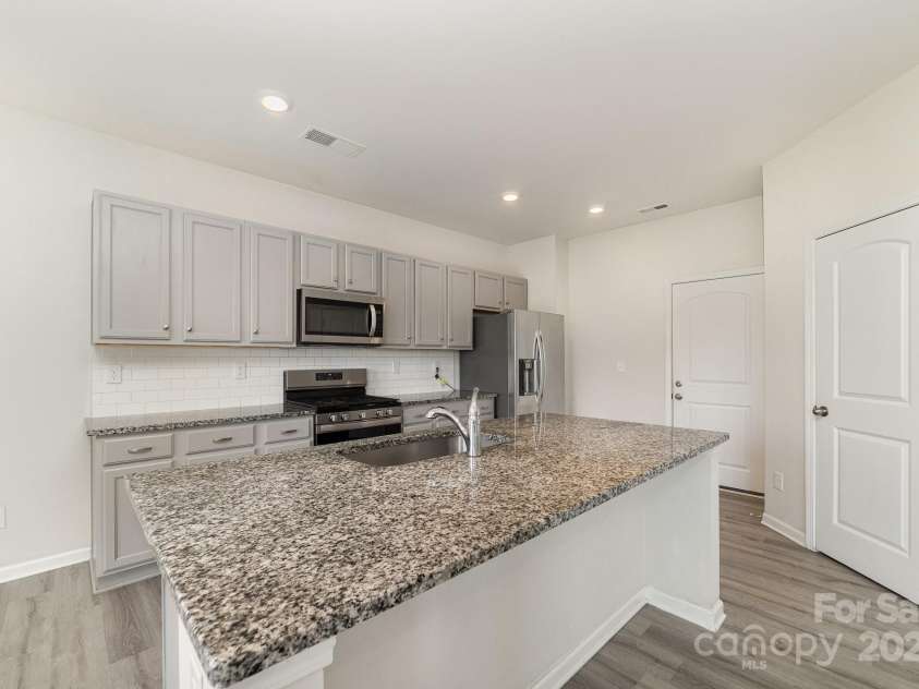 3033 Eastcott Avenue, Monroe, NC 28110.  MLS# CAR4205113, YatesRealty ID 11143. 