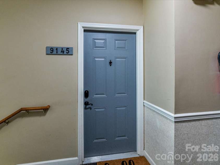 9145 Mcdowell Creek Court, Cornelius, NC 28031.  MLS# CAR4336946, YatesRealty ID 11148. Condo Entry!
