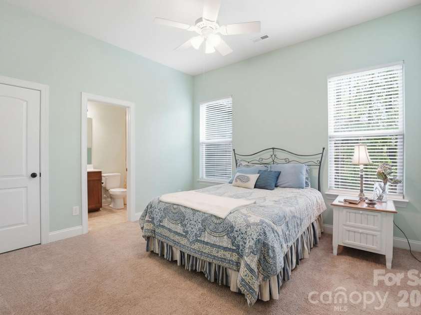 11010 Sparkle Creek Drive, Midland, NC 28107.  MLS# CAR4361341, YatesRealty ID 11151. Bedroom with en-suite