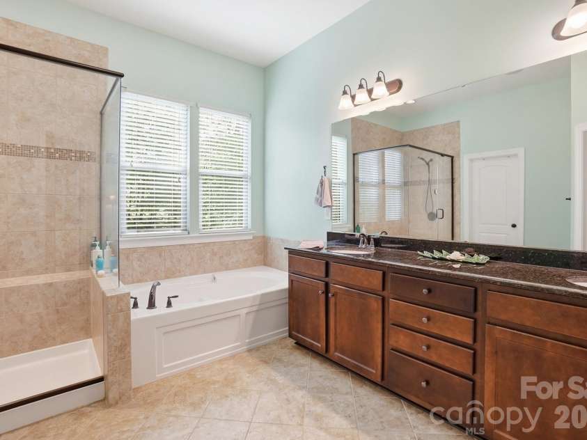 11010 Sparkle Creek Drive, Midland, NC 28107.  MLS# CAR4361341, YatesRealty ID 11151. Double sinks and lots of space