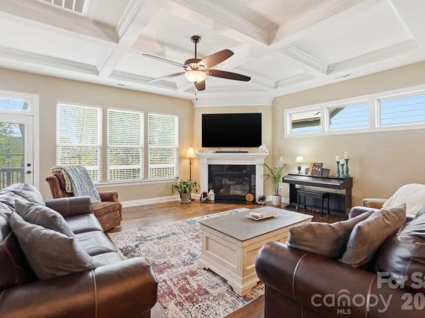 11010 Sparkle Creek Drive, Midland, NC 28107.  MLS# CAR4361341, YatesRealty ID 11151. Living room with coffer ceiling