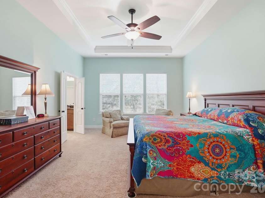11010 Sparkle Creek Drive, Midland, NC 28107.  MLS# CAR4361341, YatesRealty ID 11151. Primary bedroom with tray ceiling