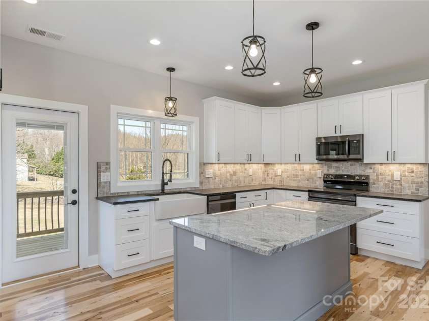 126 Whiskey River Run, Hendersonville, NC 28792.  MLS# CAR4205245, YatesRealty ID 11156. 
