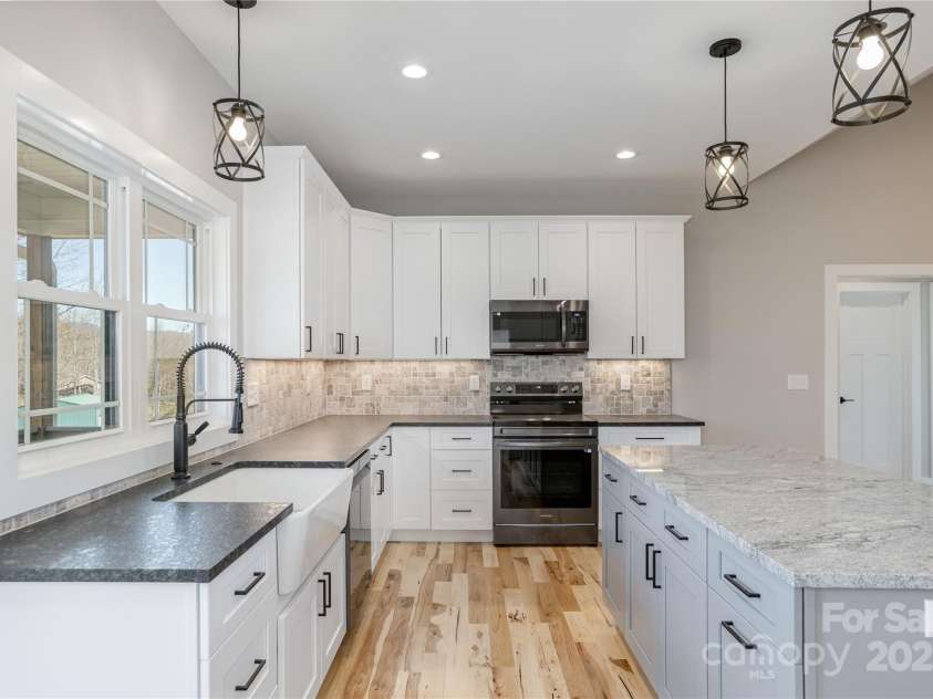 126 Whiskey River Run, Hendersonville, NC 28792.  MLS# CAR4205245, YatesRealty ID 11156. 