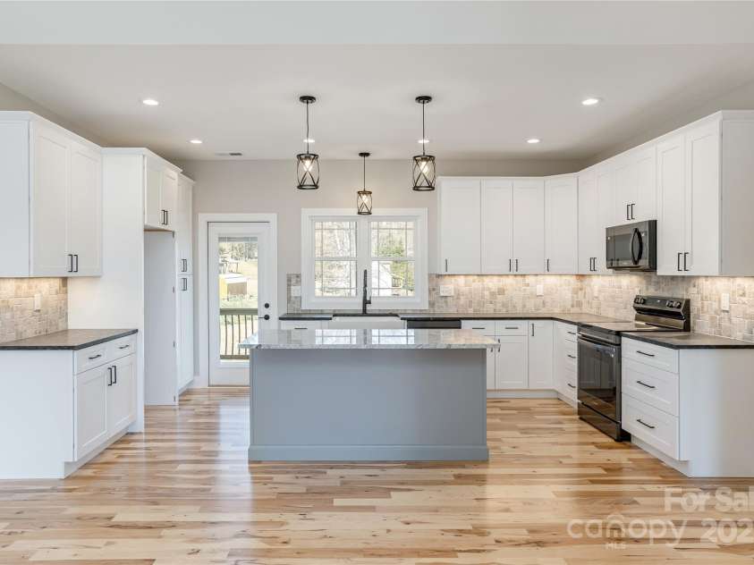 126 Whiskey River Run, Hendersonville, NC 28792.  MLS# CAR4205245, YatesRealty ID 11156. 