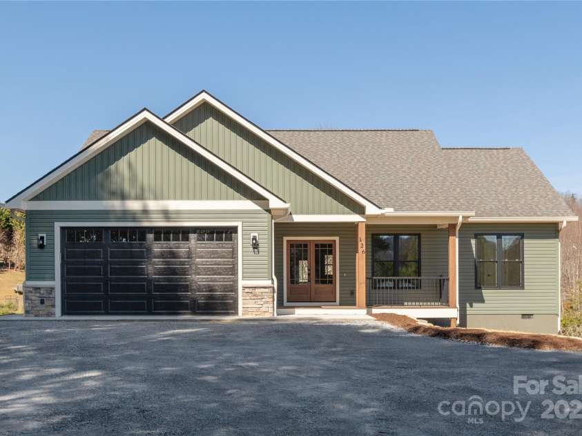 126 Whiskey River Run, Hendersonville, NC 28792.  MLS# CAR4205245, YatesRealty ID 11156. Drive in front of garage to be paved prior to closing
