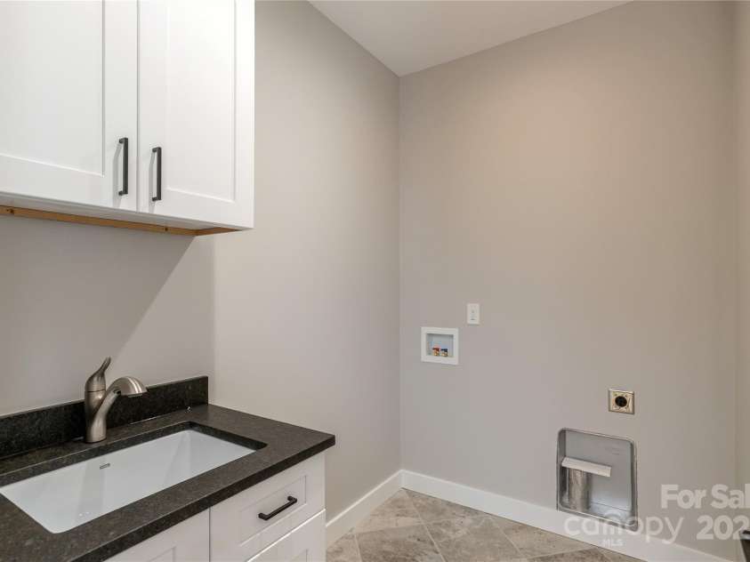 126 Whiskey River Run, Hendersonville, NC 28792.  MLS# CAR4205245, YatesRealty ID 11156. Laundry