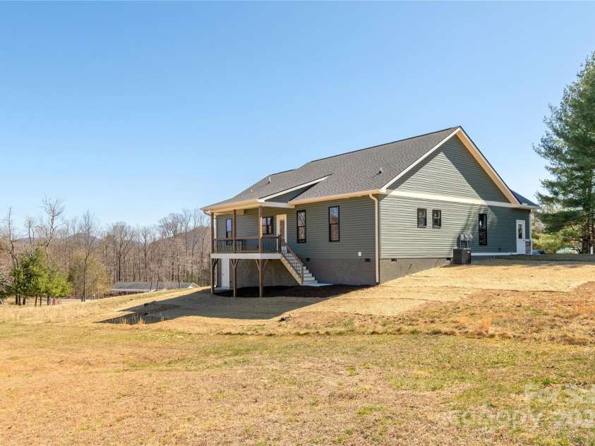 126 Whiskey River Run, Hendersonville, NC 28792.  MLS# CAR4205245, YatesRealty ID 11156. Rear of home