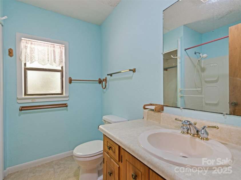 1010 Autumn Drive, Maggie Valley, NC 28751.  MLS# CAR4284241, YatesRealty ID 1116. Bathroom downstairs 