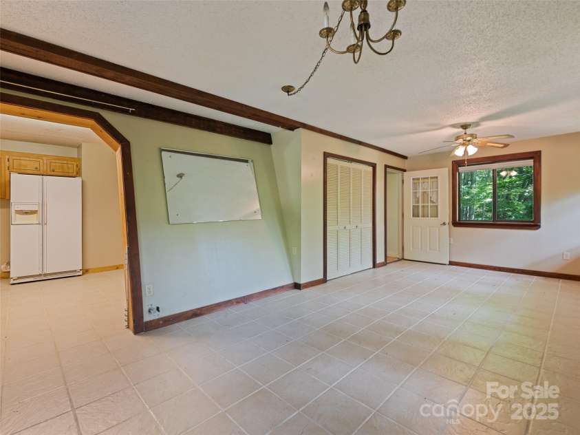 1010 Autumn Drive, Maggie Valley, NC 28751.  MLS# CAR4284241, YatesRealty ID 1116. Dining area with room for sitting area 