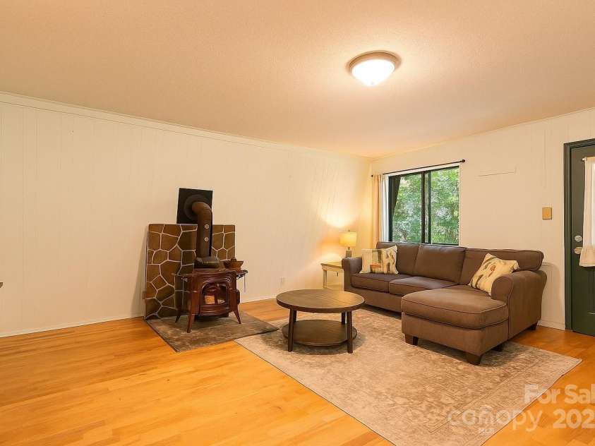 1010 Autumn Drive, Maggie Valley, NC 28751.  MLS# CAR4284241, YatesRealty ID 1116. Living Room virtually Staged 
