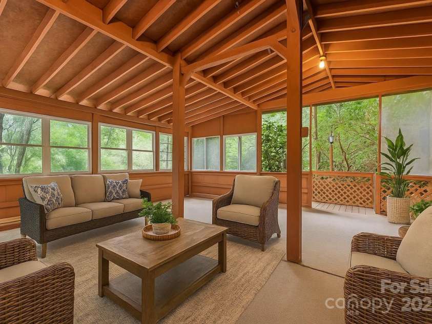 1010 Autumn Drive, Maggie Valley, NC 28751.  MLS# CAR4284241, YatesRealty ID 1116. Porch virtually staged 