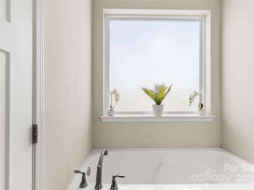 2504 Hovis Road, Lincolnton, NC 28092.  MLS# CAR4225374, YatesRealty ID 11164. Large soaker tub with separate shower