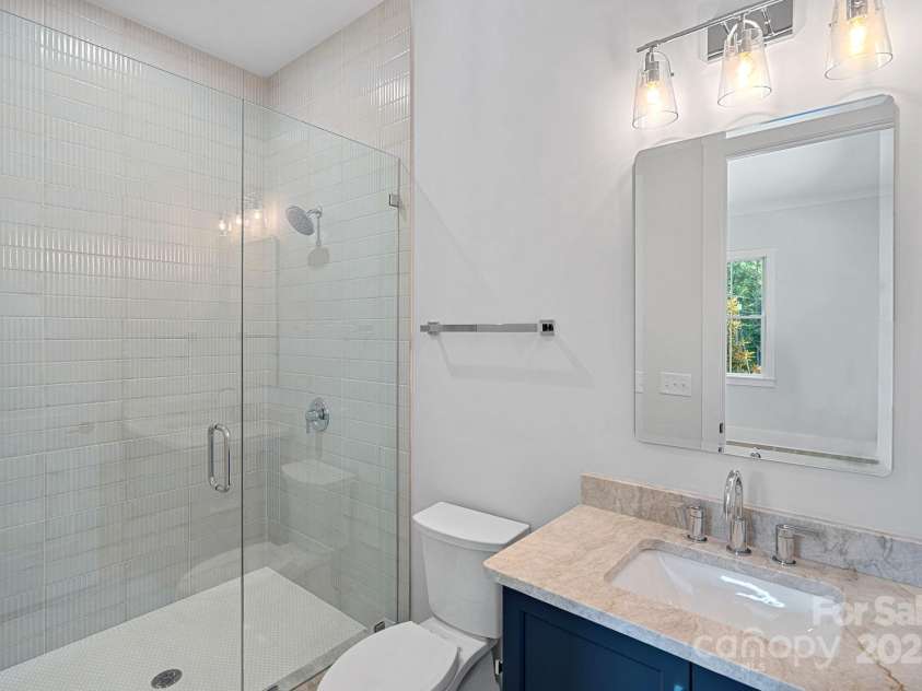 2010 Bessbrook Road, Fort Mill, SC 29708.  MLS# CAR4284508, YatesRealty ID 11165. Ensuite bathroom for Bedroom #2. I love the tile in this home!