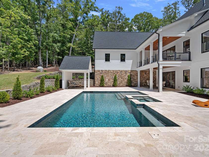 2010 Bessbrook Road, Fort Mill, SC 29708.  MLS# CAR4284508, YatesRealty ID 11165. Saltwater Pool and Spa with Travertine Decking