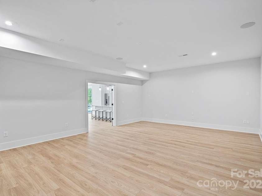 2010 Bessbrook Road, Fort Mill, SC 29708.  MLS# CAR4284508, YatesRealty ID 11165. This space is perfect for a golf simulator, gym, movie room, or whatever you like!