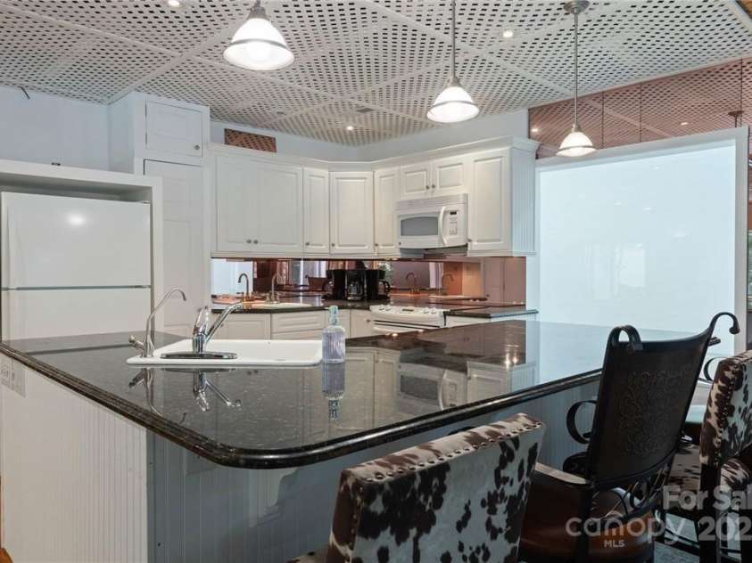 122 Mountain Harbor Drive, Lexington, NC 27292.  MLS# CAR4217597, YatesRealty ID 11172. Kitchen in rec room