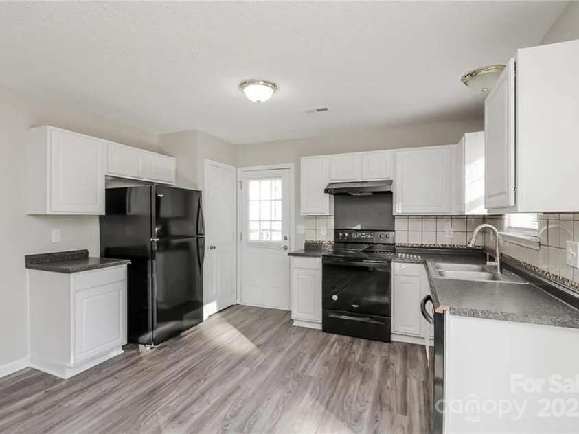 7830 Lobilia Lane, Charlotte, NC 28214.  MLS# CAR4252115, YatesRealty ID 11173. 