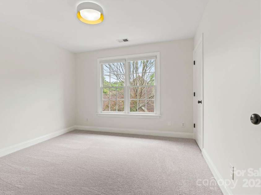 8032 Turnberry Lane, Stanley, NC 28164.  MLS# CAR4250086, YatesRealty ID 11180. Bedroom 3 on upper floor